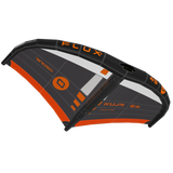 A wing foil wing shown at an angle on a plain white background, featuring a black frame with orange and gray panels and printed branding including FLUX V3 and Ozone.