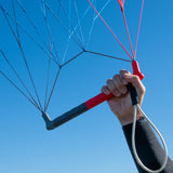 Ozone Bow bar with hand holding it for example against blue sky