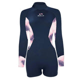 Navy blue wetsuit with pink and white palm leaf patterns on a white background